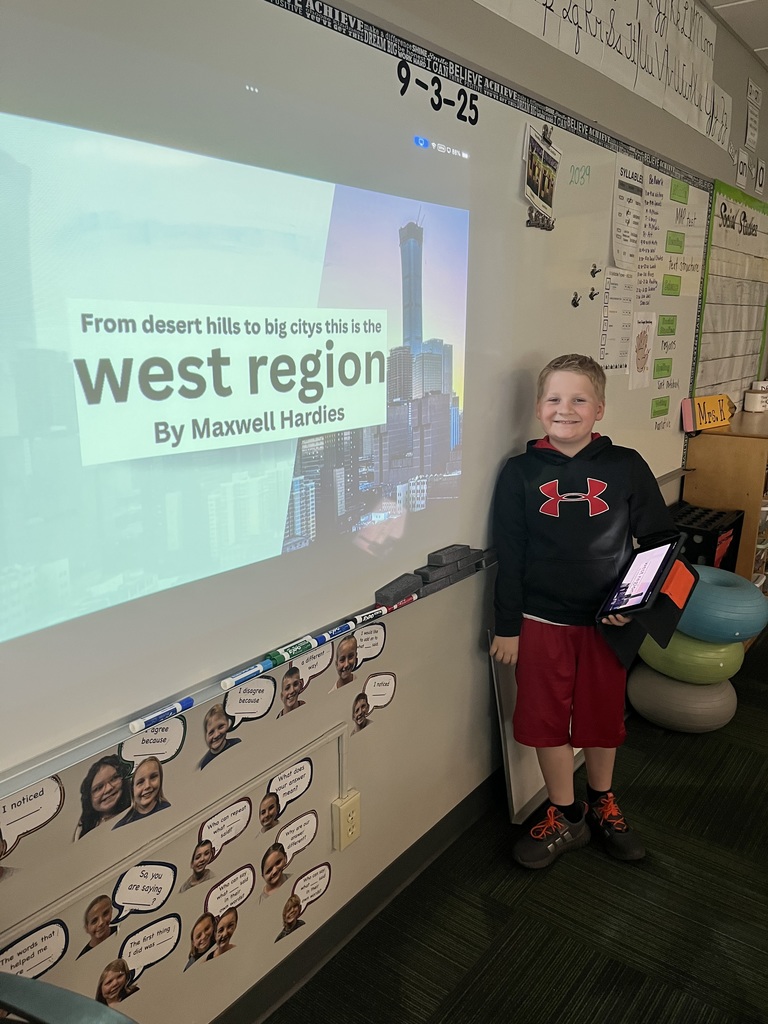 Boy standing in front of a whiteboard with facts about the West region.