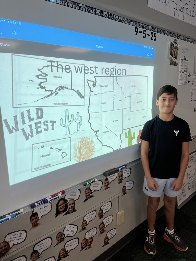 Boy standing in front of a whiteboard with a map of the West region.