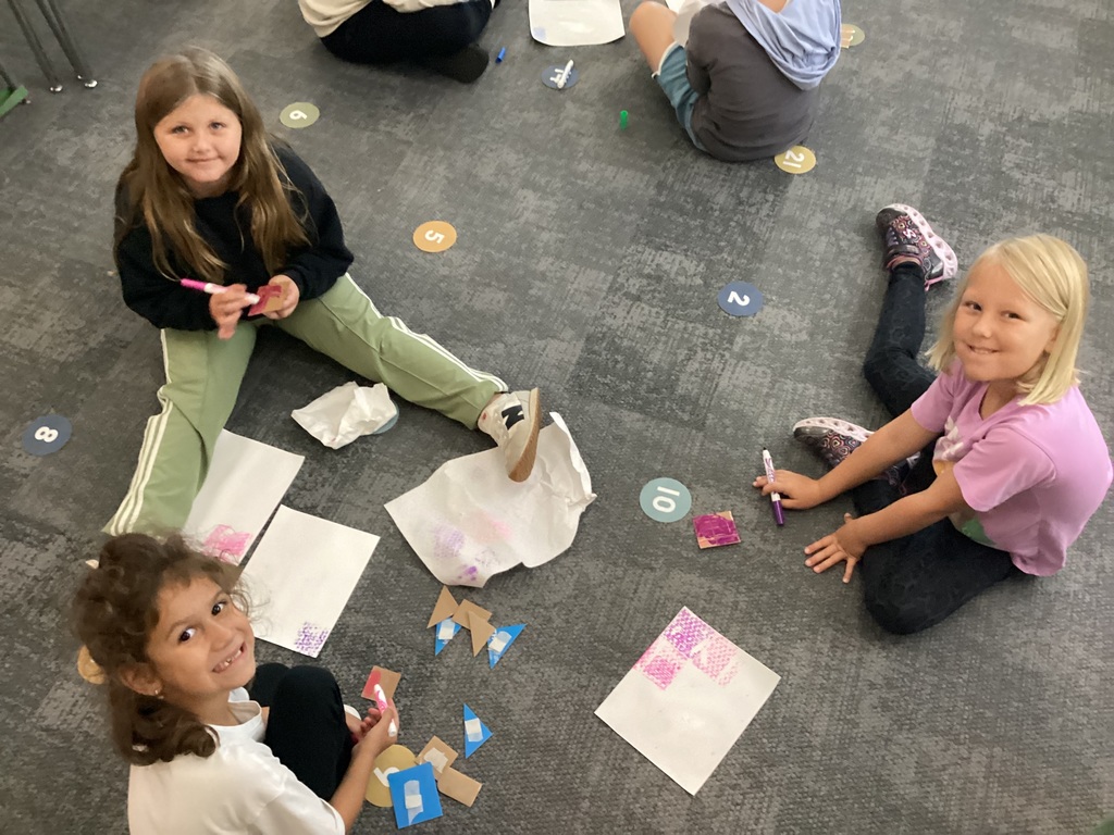 students working on art in a classroom