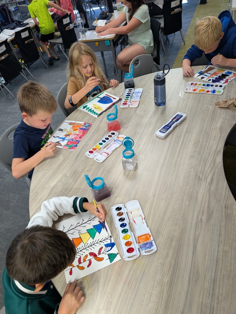 students working on an art project in a classroom