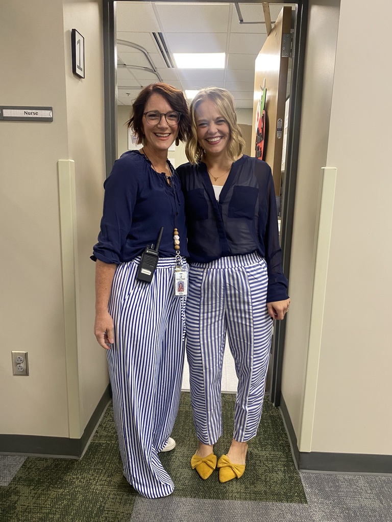 two adults matching smiling