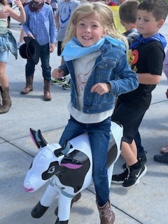kids playing round up games outside