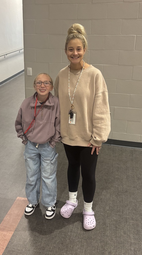 A staff member and student who dressed up for spirit week. 