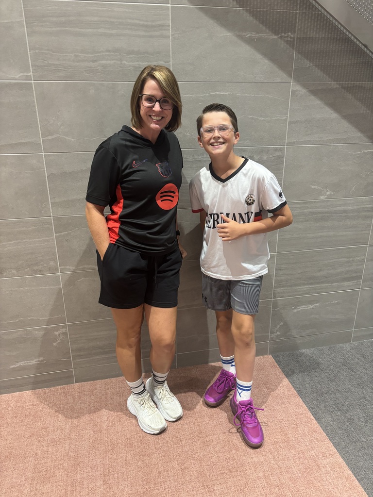 A staff member and student who dressed up for spirit week. 