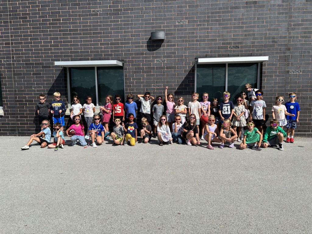 First graders outside wearing their sunglasses.