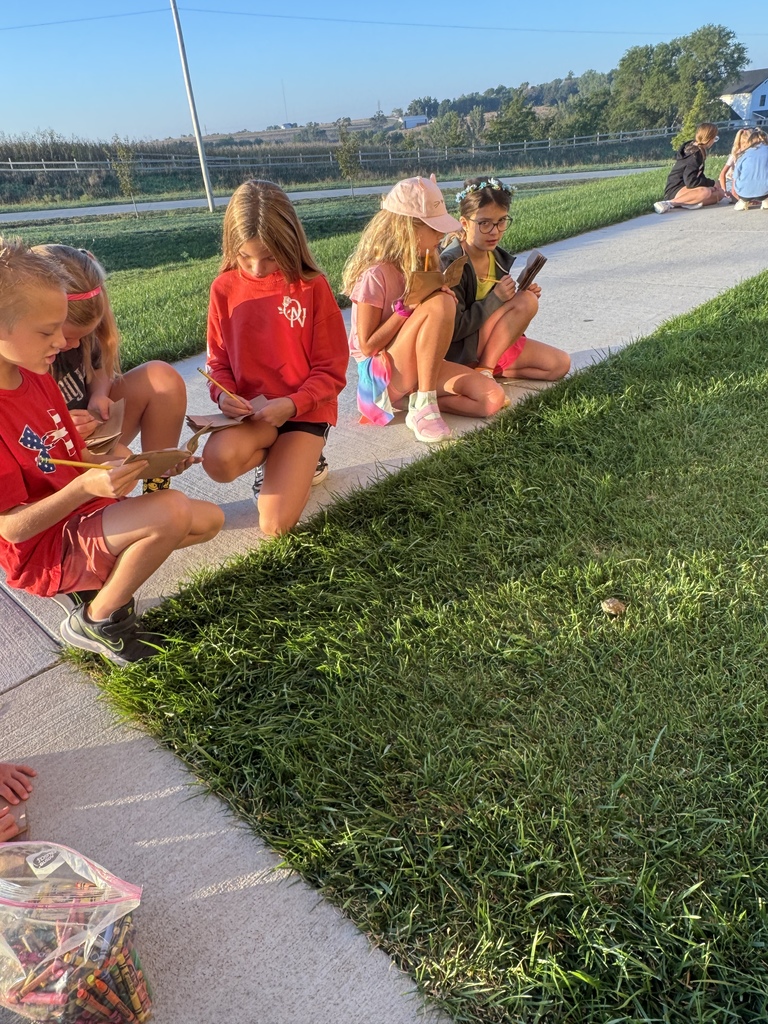 kids sketching outside