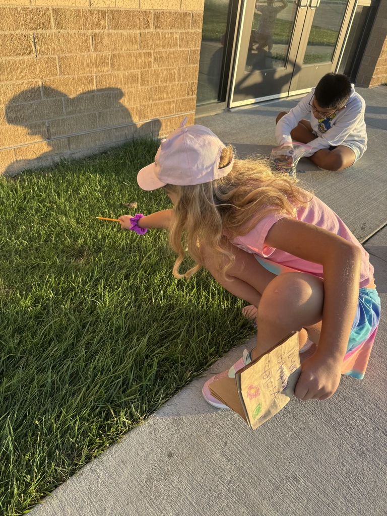 kids sketching outside