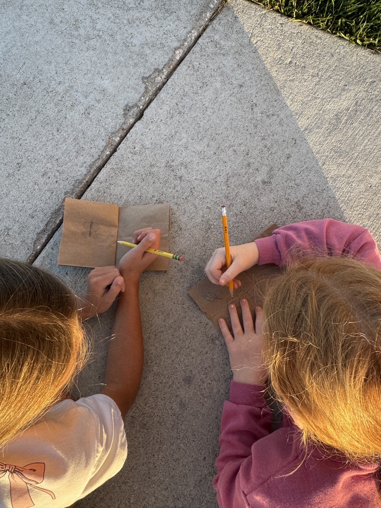 kids sketching outside