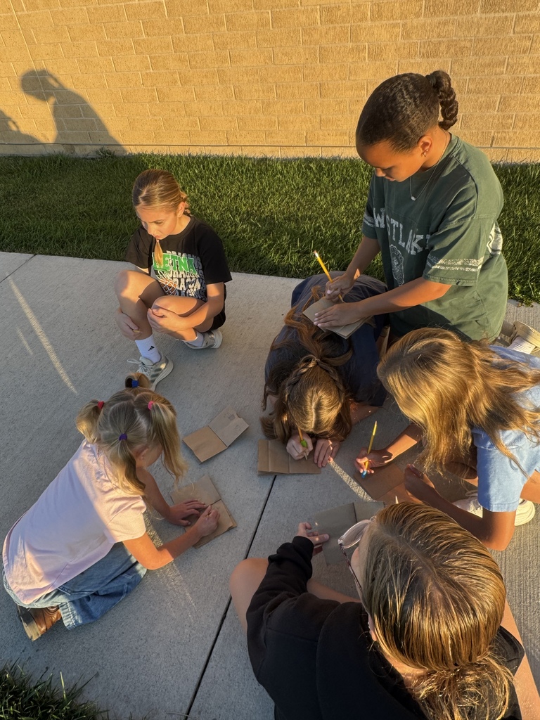 kids sketching outside