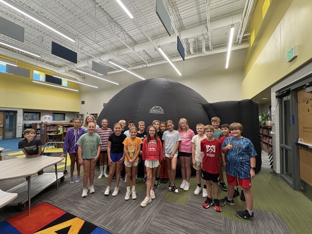 This is a picture of Mrs. Heinke's class in front of the planetarium.