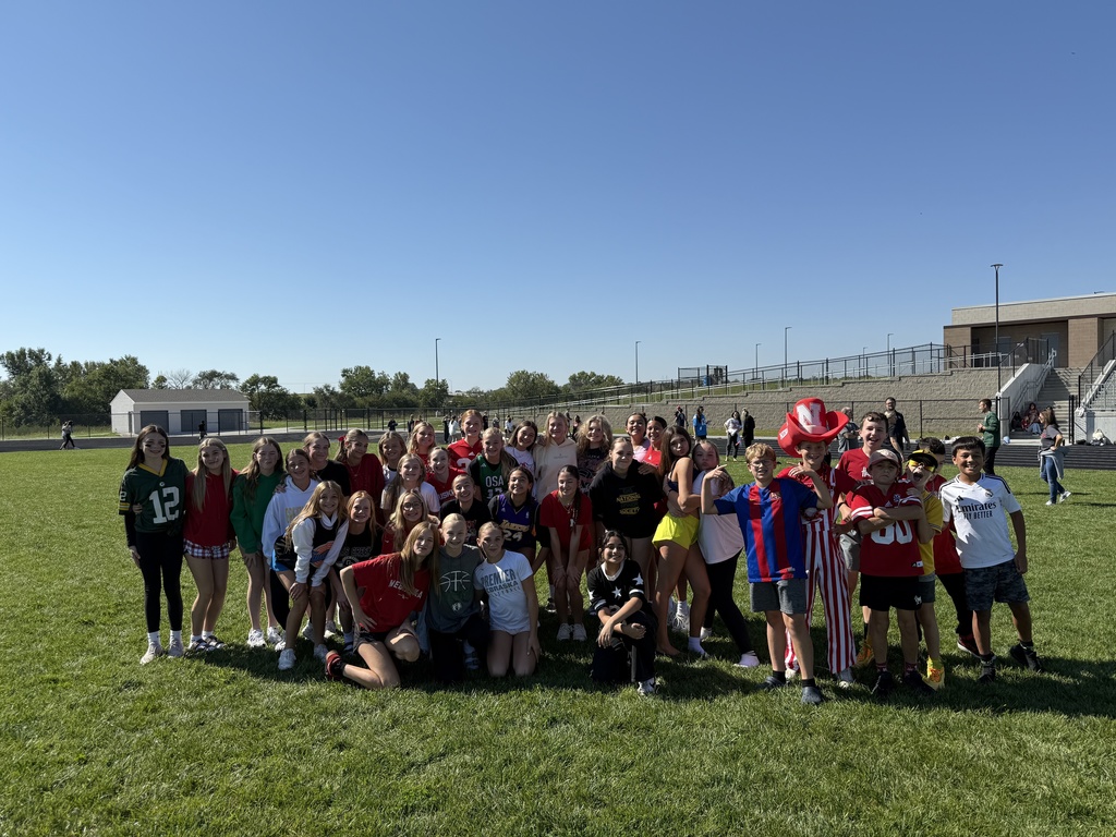 Students on the football field.
