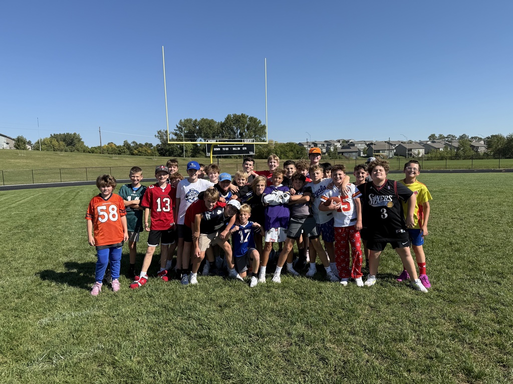 Students on the football field.