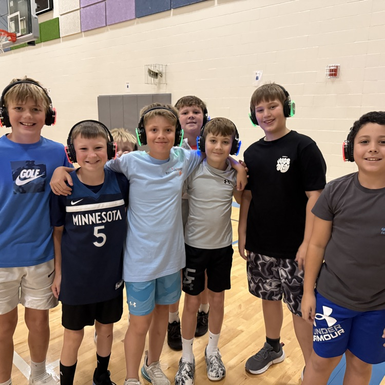Group of 5th graders with silent disco headphones