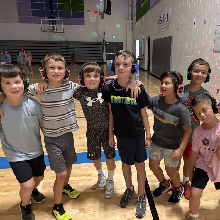 Group of 2nd graders with silent disco headphones