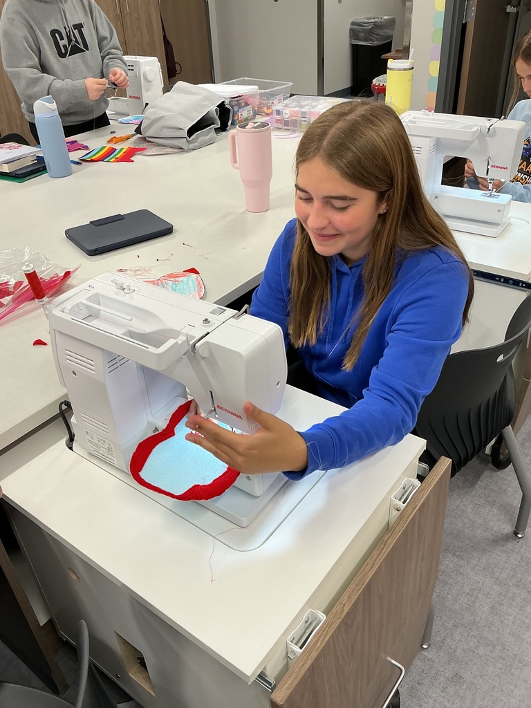 8th grade sewing students working on the monster project. 