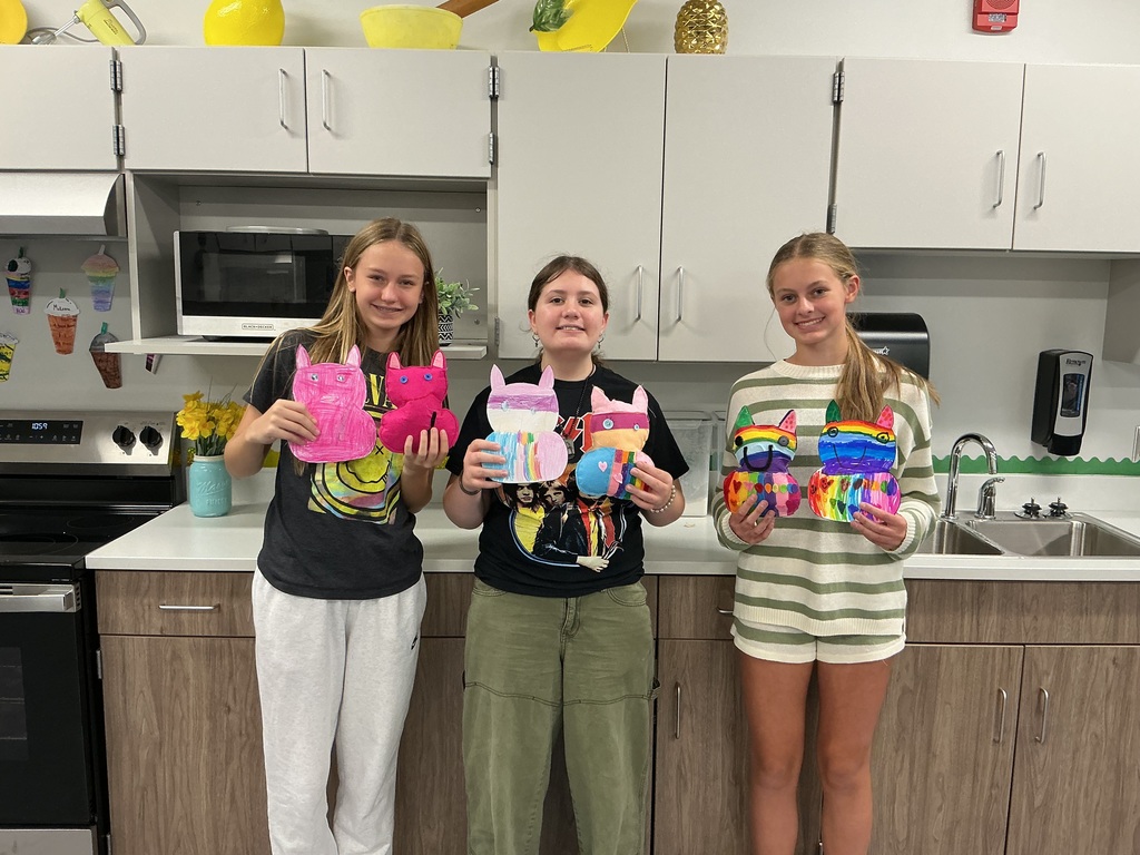 8th grade sewing students with their monsters. 