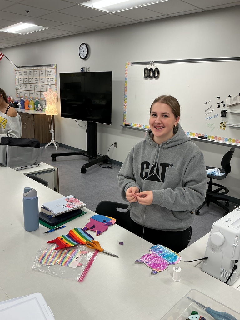 8th grade sewing students with their monsters. 