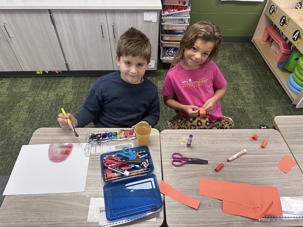 first graders playing in the classroom