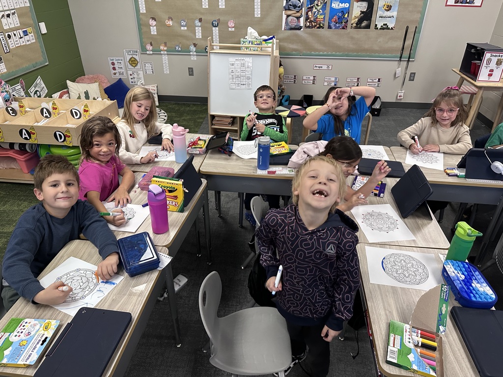 First graders working on a project in the classroom