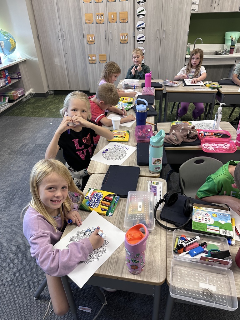 First graders working on a project in the classroom
