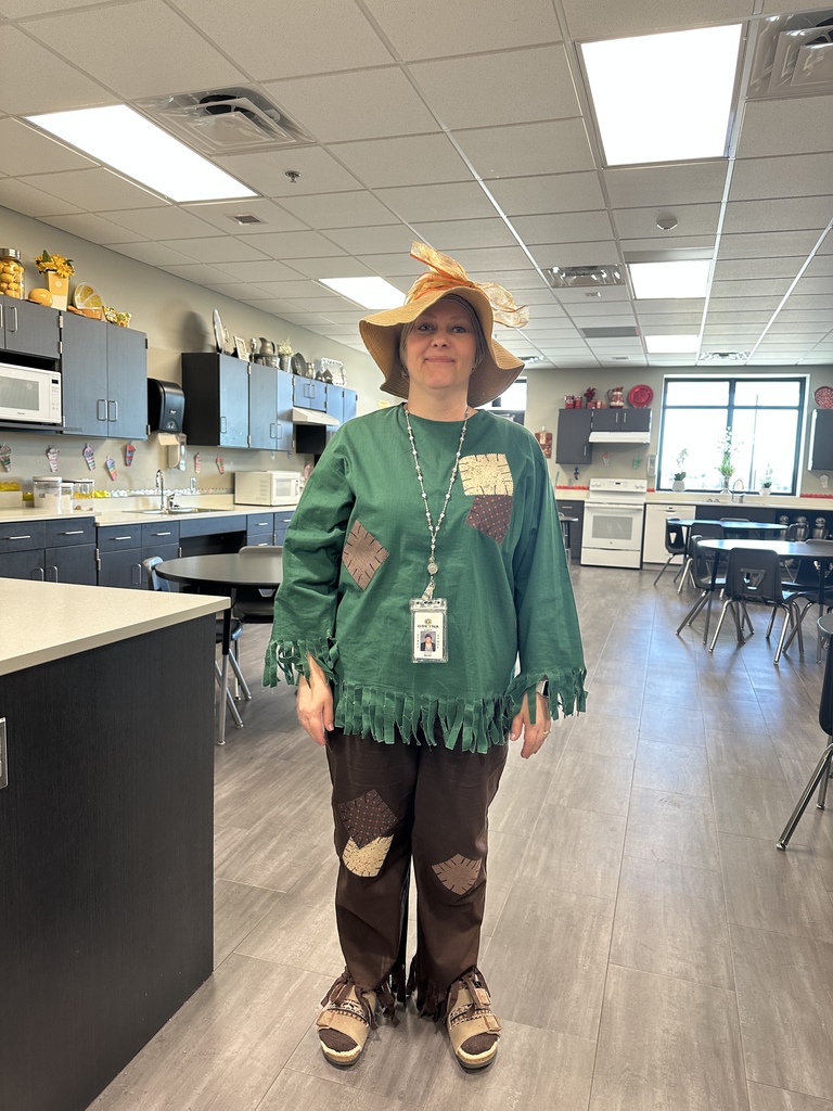 Photo of a teacher dressed as a scarecrow.