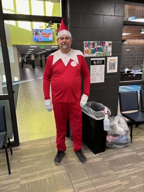 Photo of a staff member dressed as an elf.