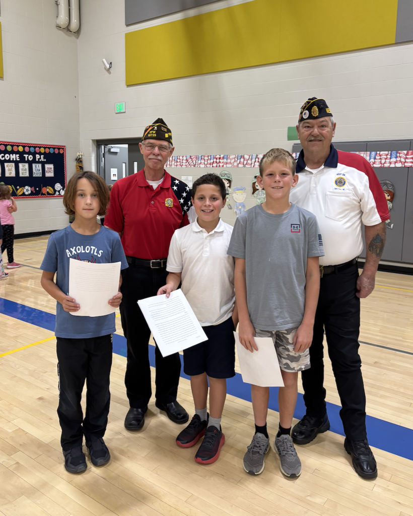 Photo of guest readers and the VFW and American Legion Color Guard.