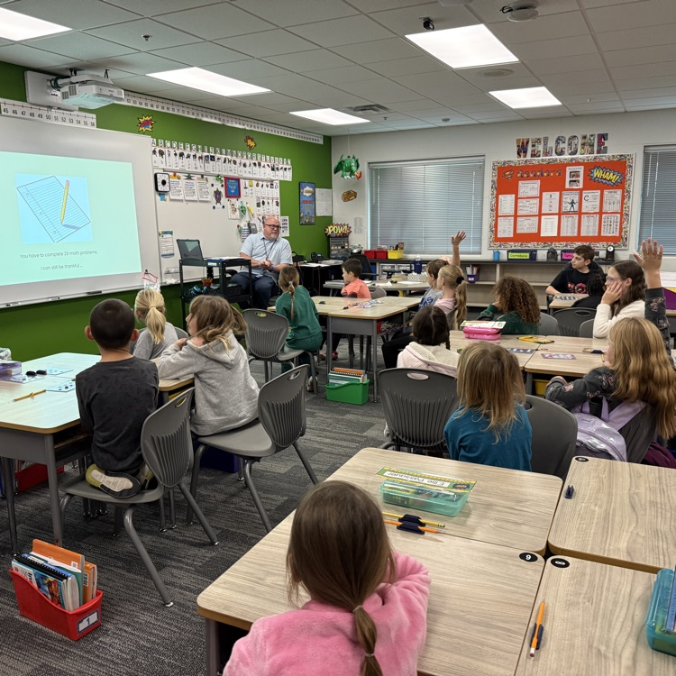 students look at the board for a gratitude scenarios 