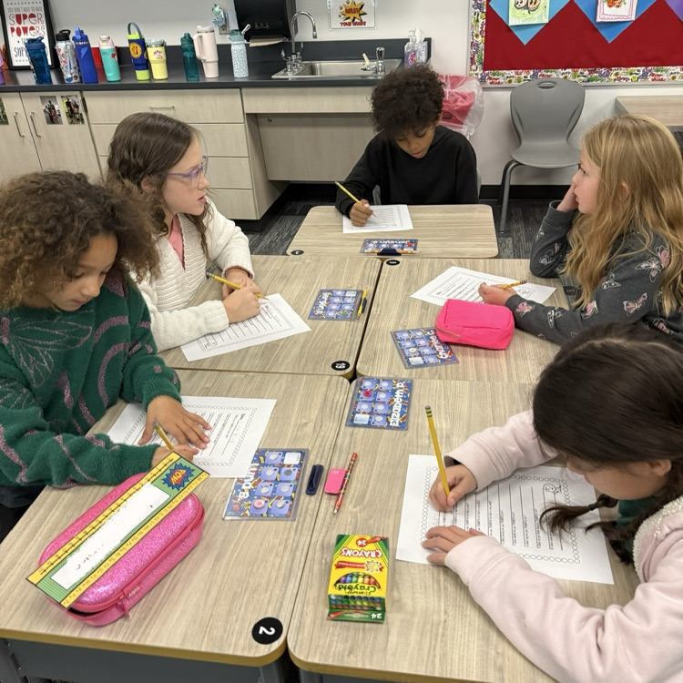 5 students work on gratitude lists