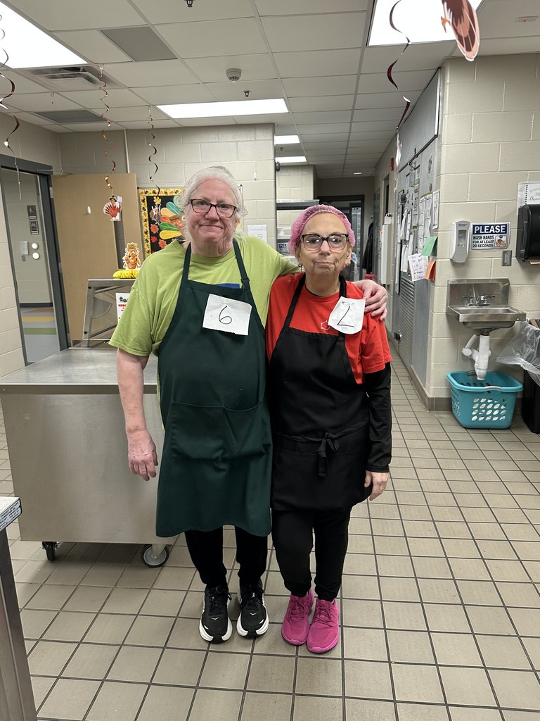 kitchen staff posing for a photo