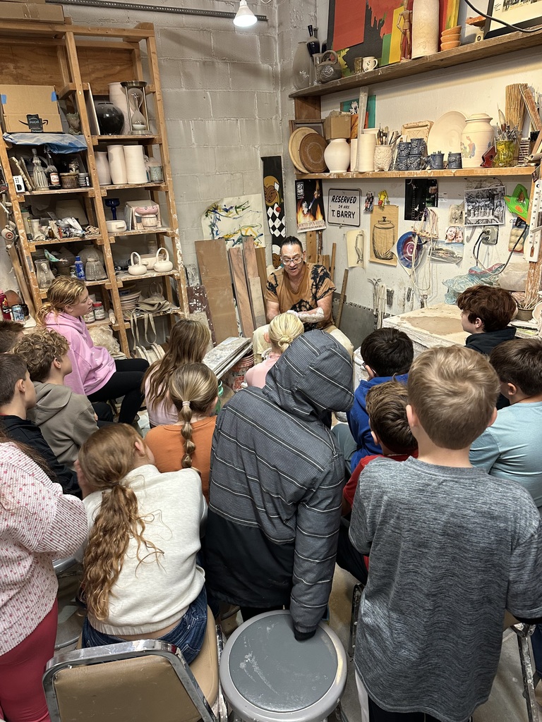 5th graders learning about hot shops on their field trip