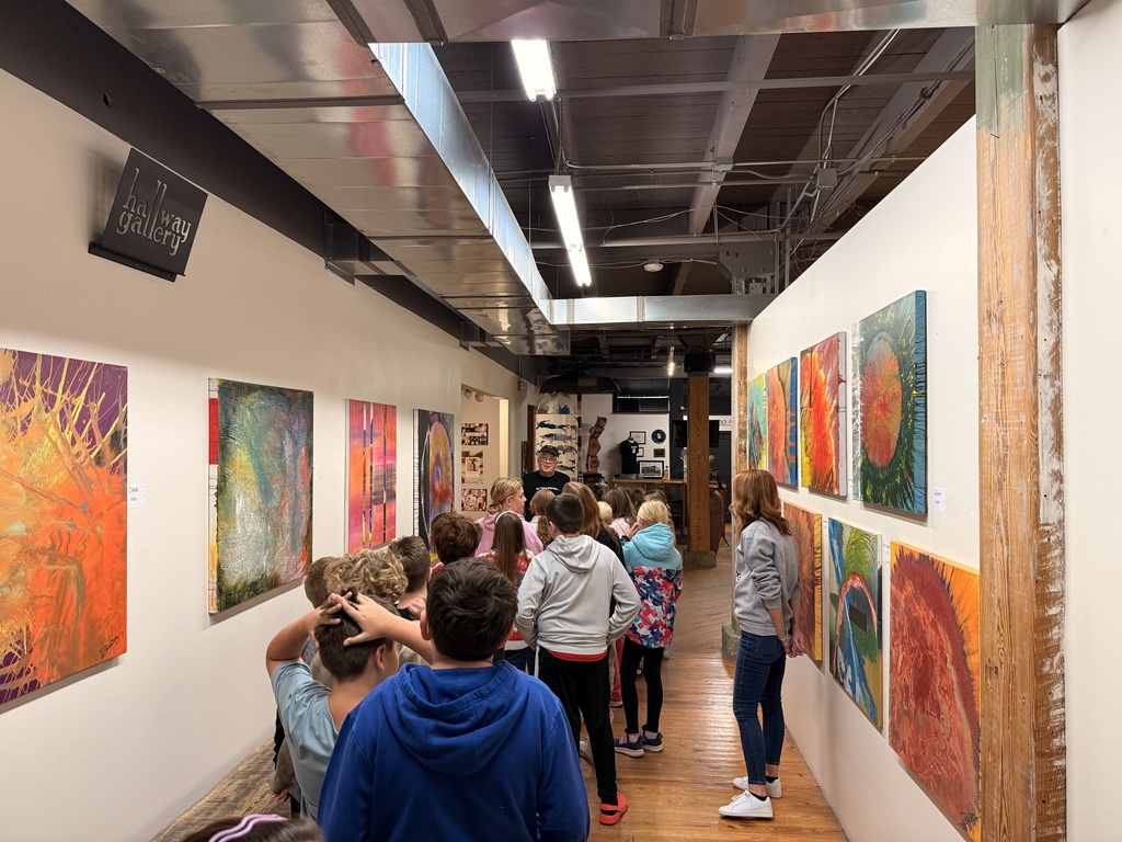 5th graders learning about hot shops on their field trip