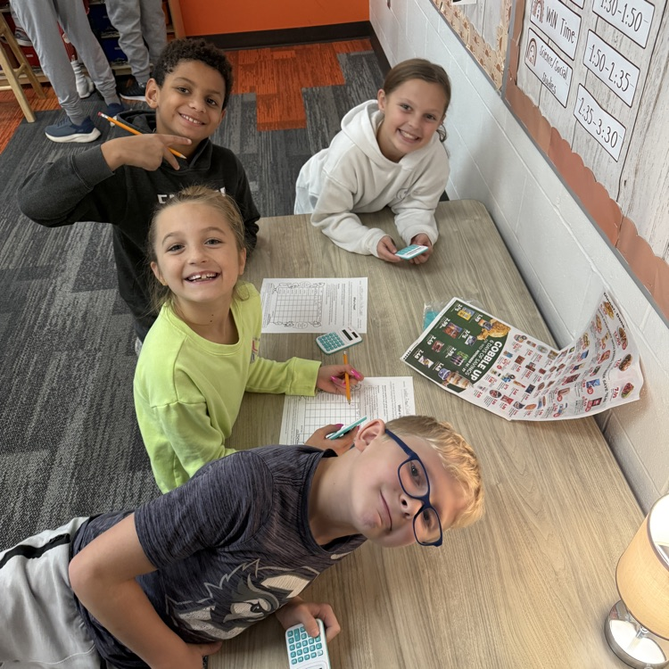 4 students are creating a Thanksgiving meal on a budget 