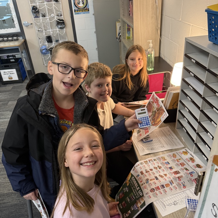 4 students are creating a Thanksgiving meal on a budget 