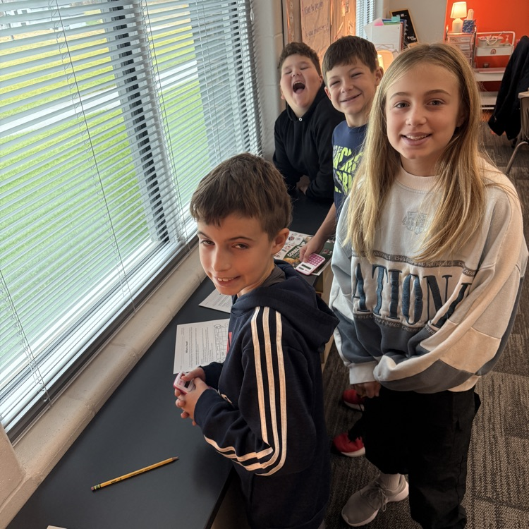 4 students are creating a Thanksgiving meal on a budget 