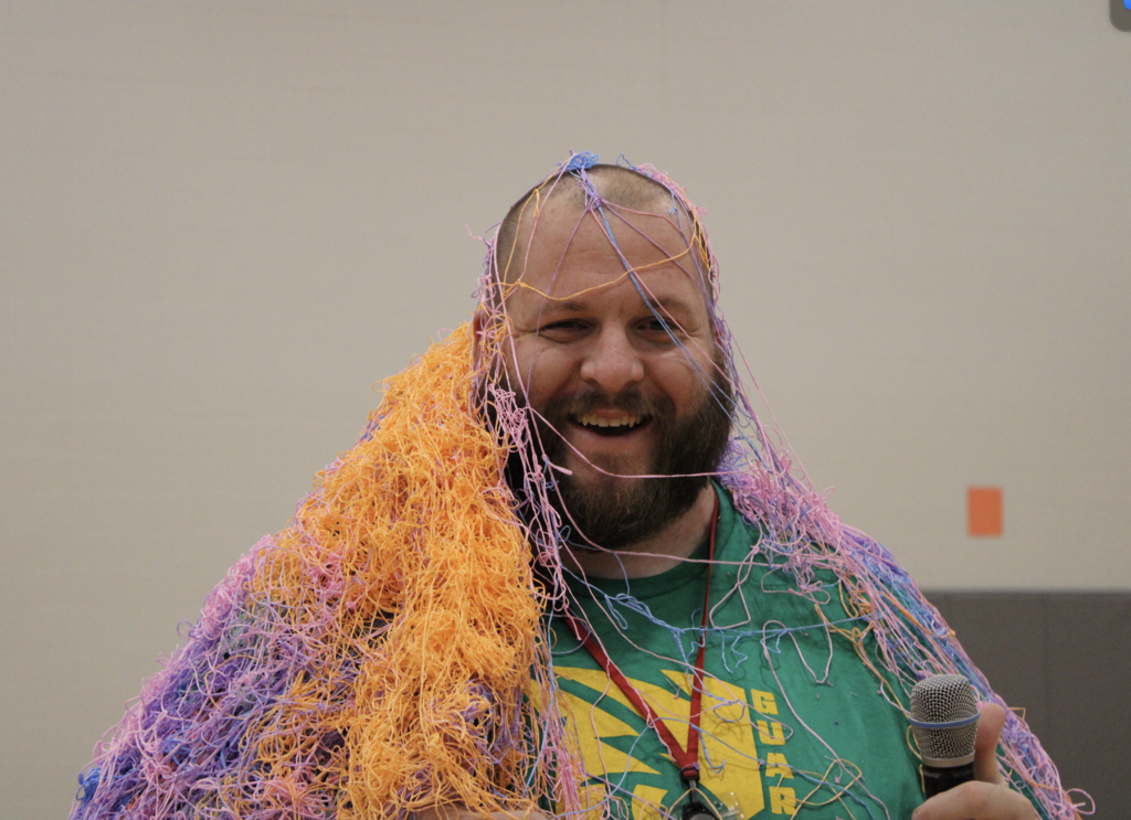 Mr. Runyon smiles for the camera after being sprayed with silly string by his teachers!