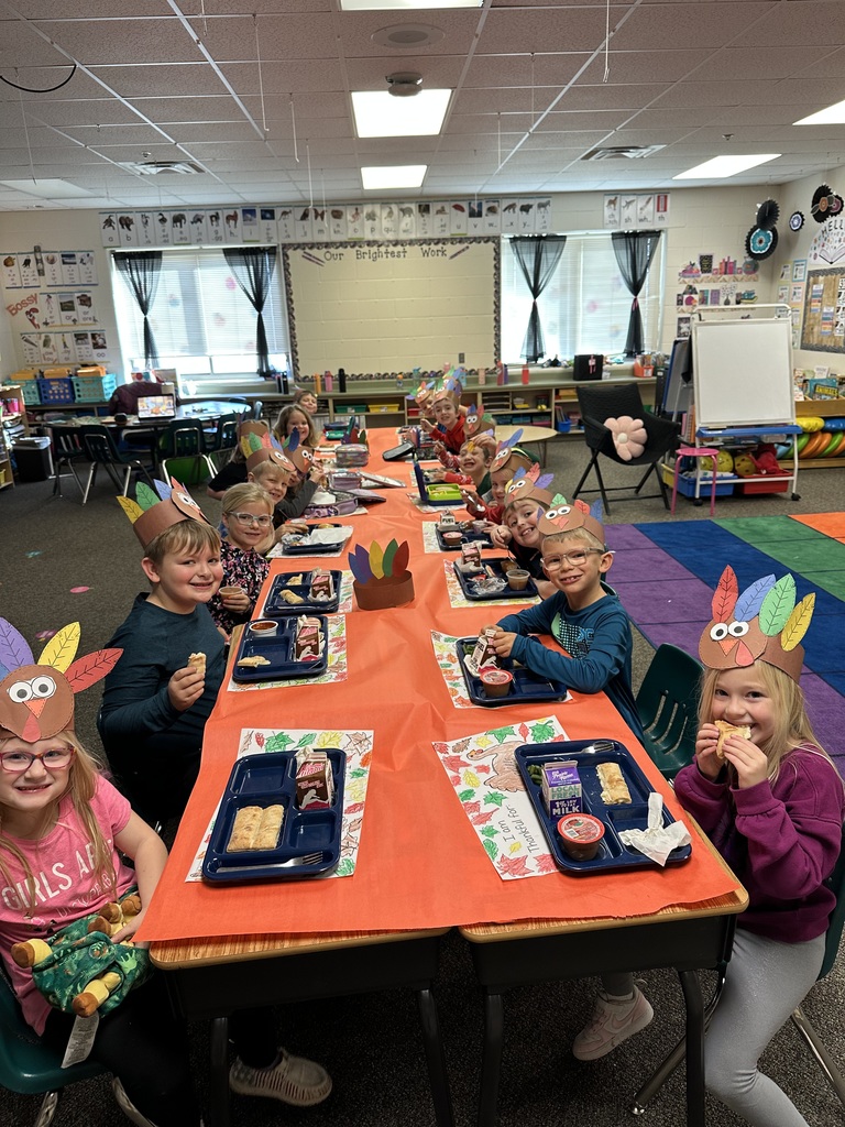 First grade students eating lunch in their classroom