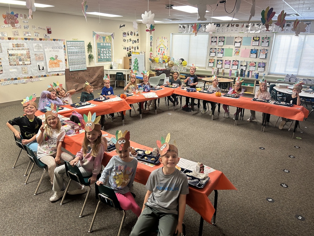First grade students eating lunch in their classroom