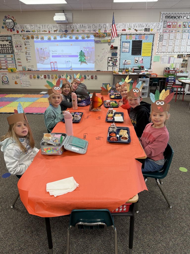 First grade students eating lunch in their classroom