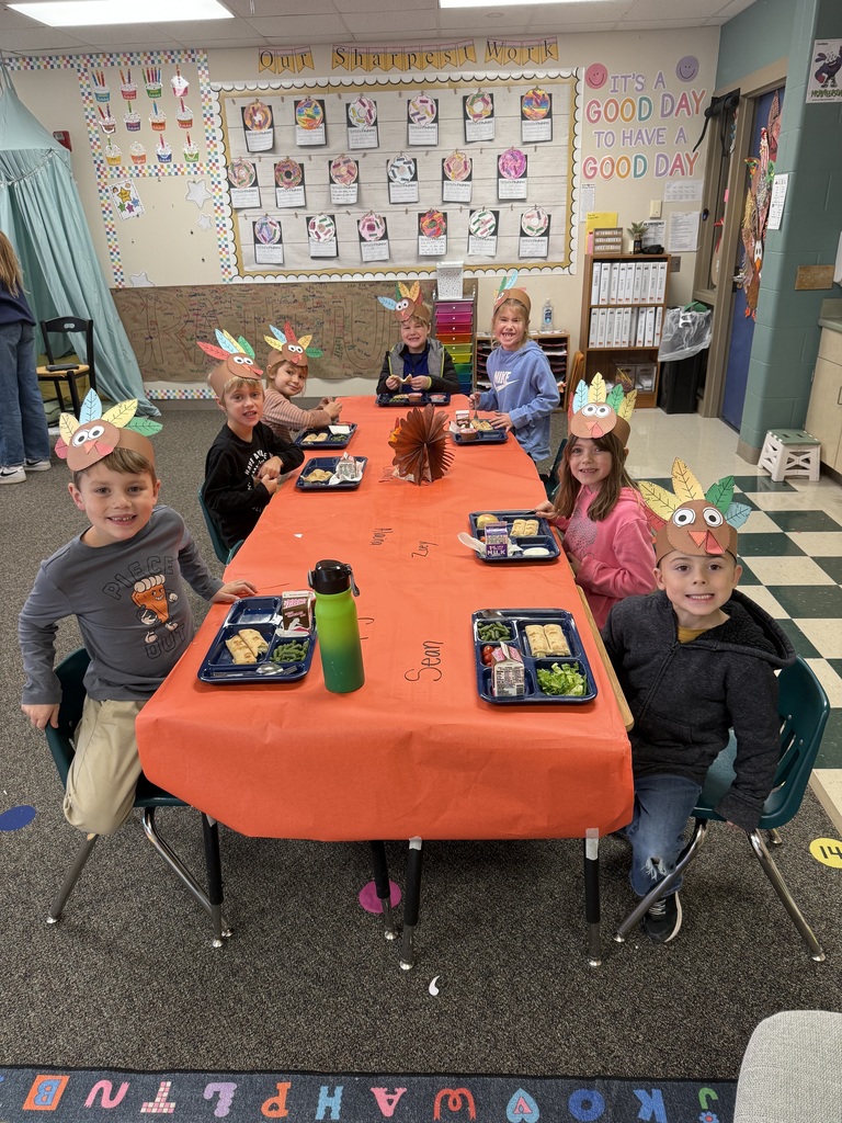 First grade students eating lunch in their classroom