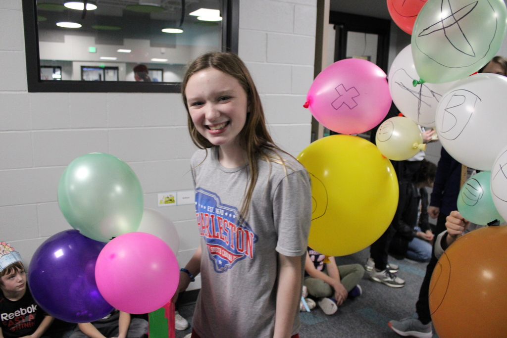 A 5th grader shows her excitement for the parade! 