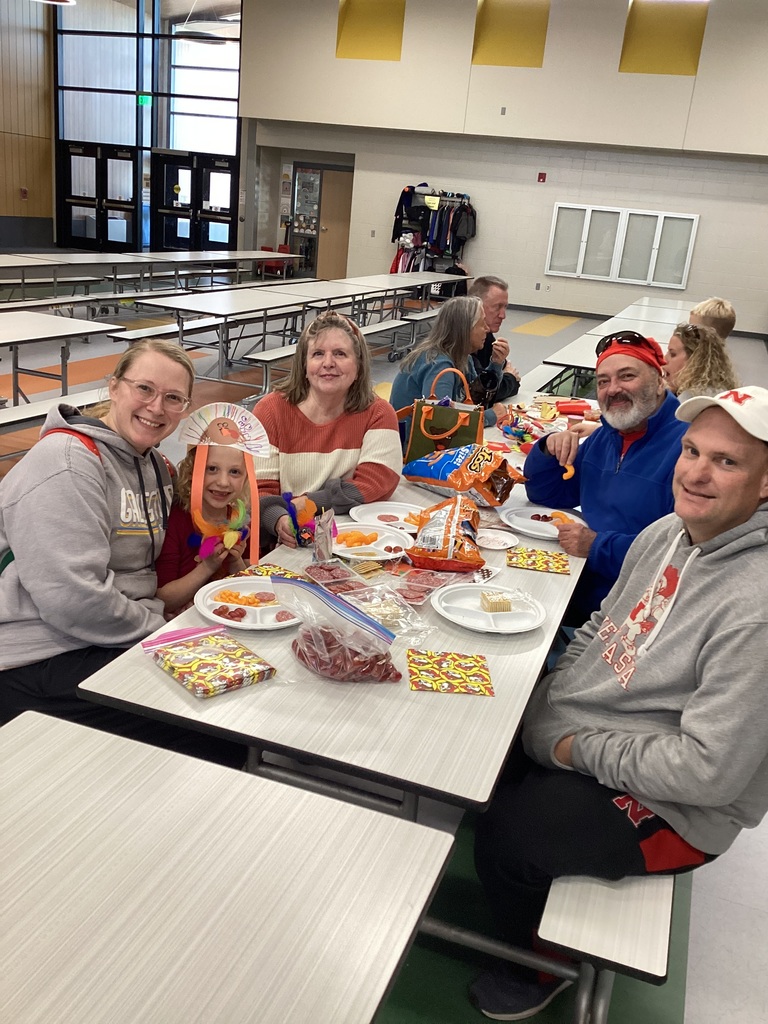 student and their family in the cafeteria