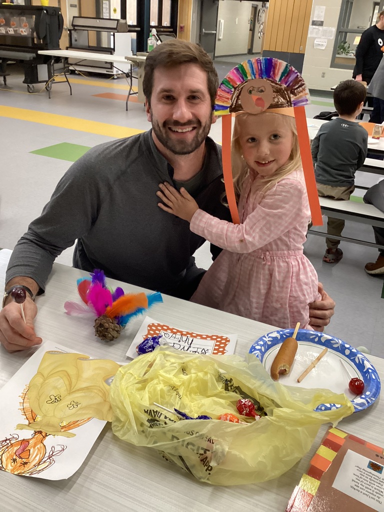 student and their family in the cafeteria