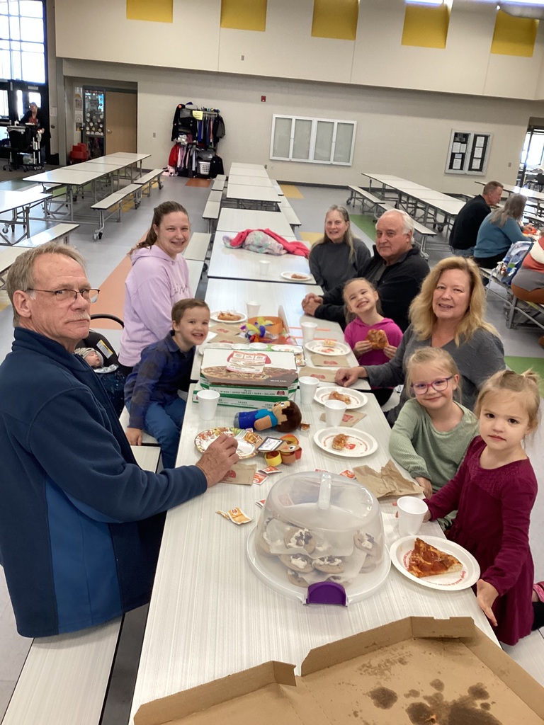 student and their family in the cafeteria