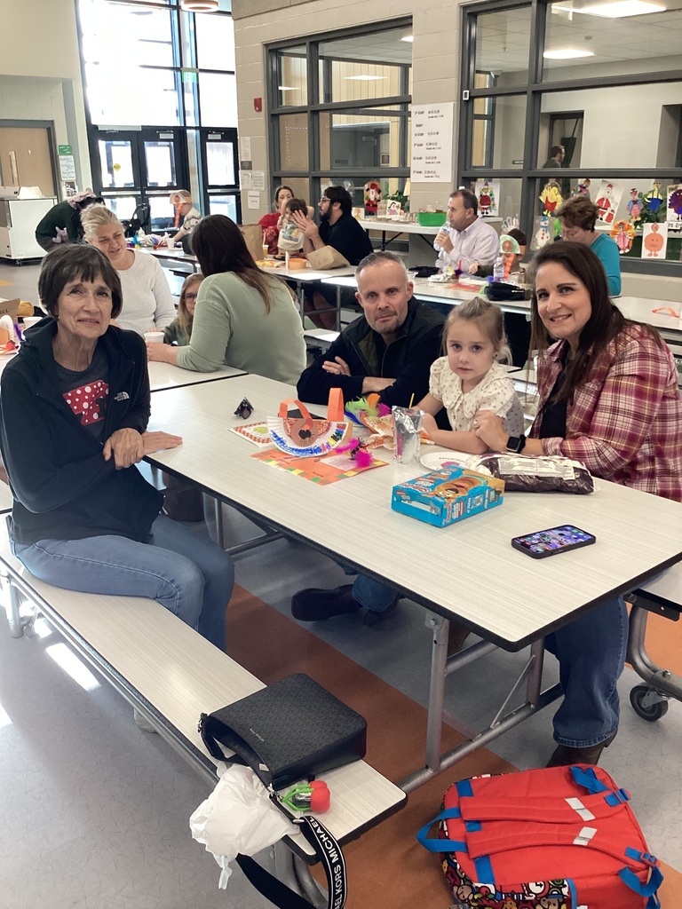 student and their family in the cafeteria