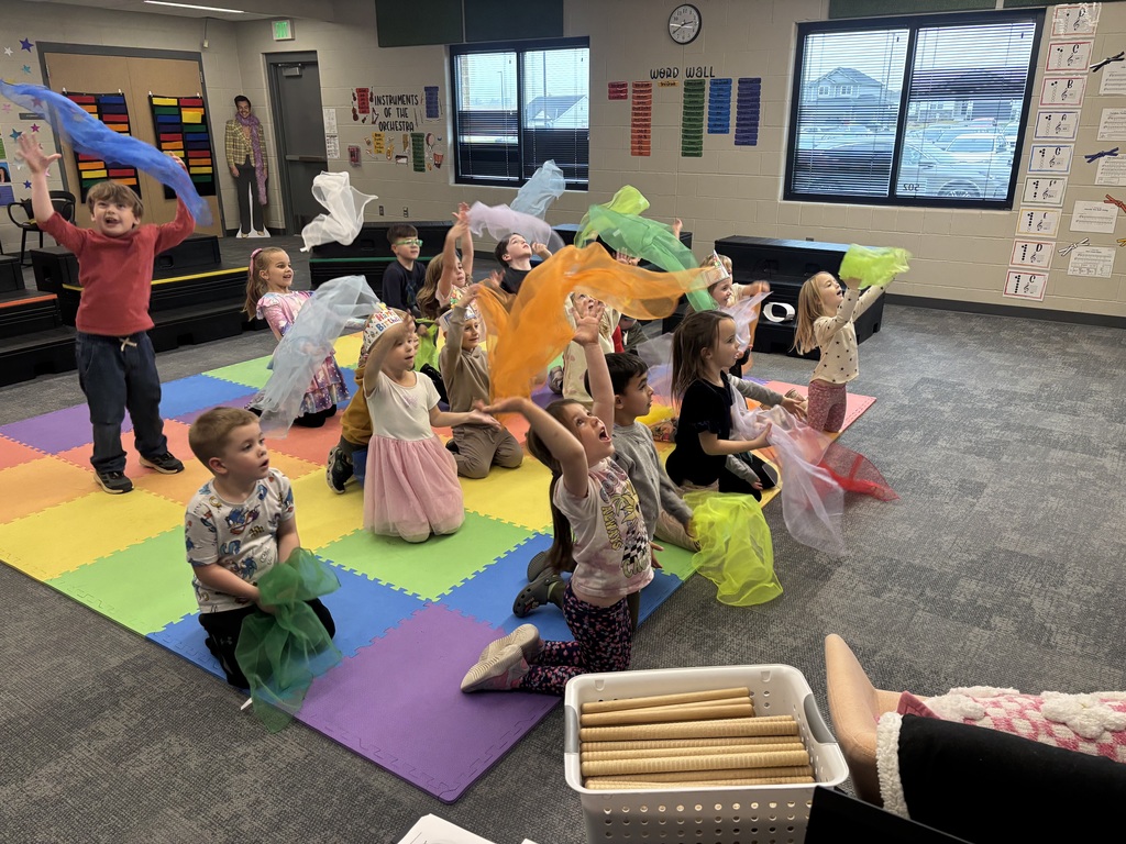 kindergarteners with scarves in music class
