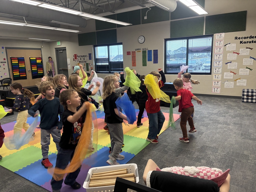 kindergarteners with scarves in music class