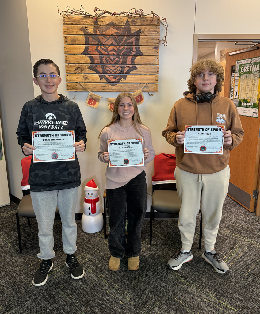 Colin Lingbloom, Elle Burrell and Caleb Finch hold their Strength of Spirit certificate.