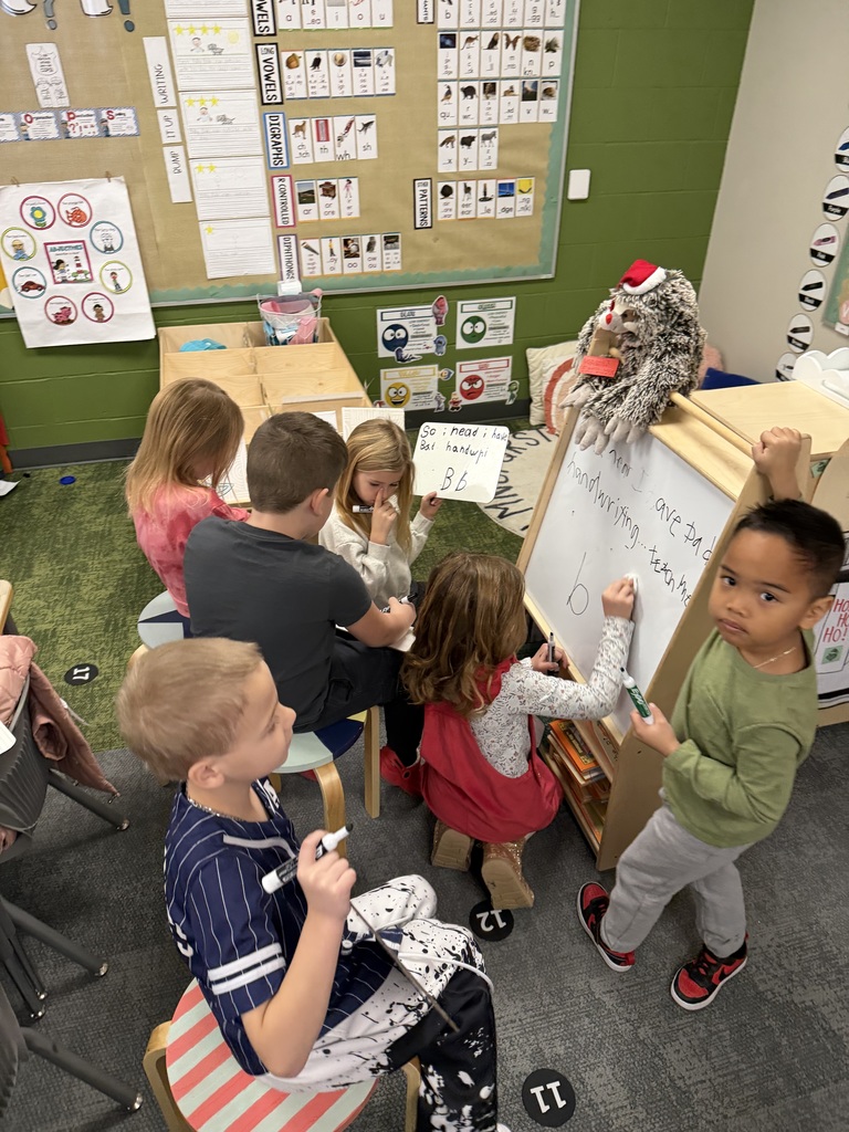 first graders writing in class