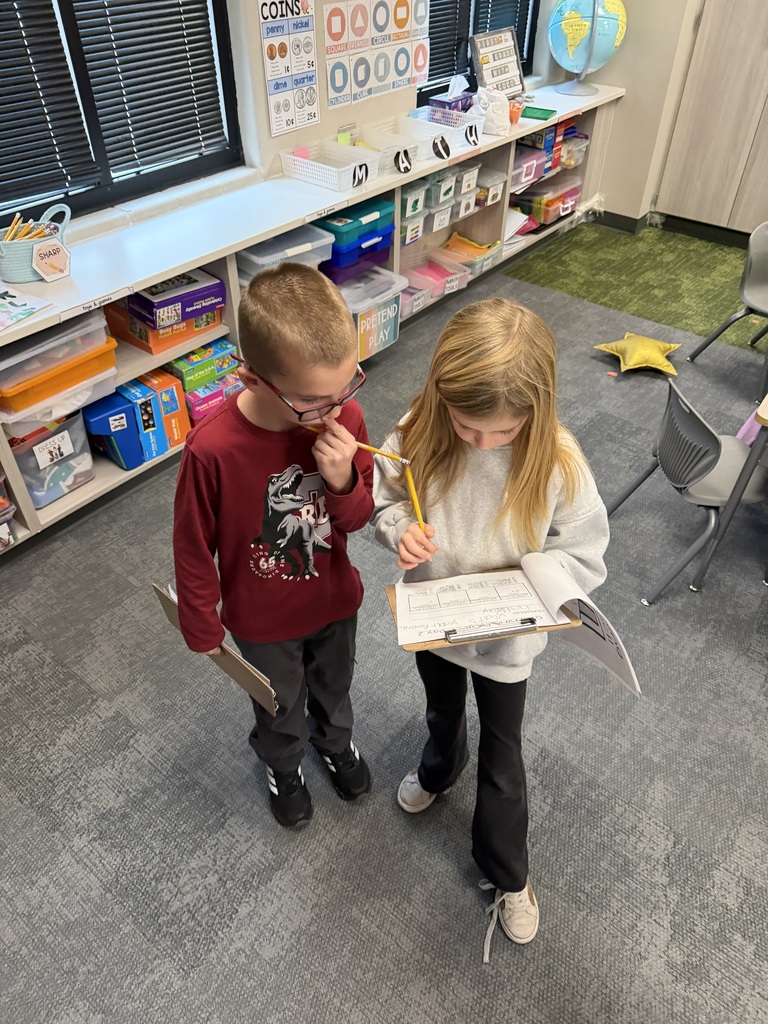 students working on a survey in class